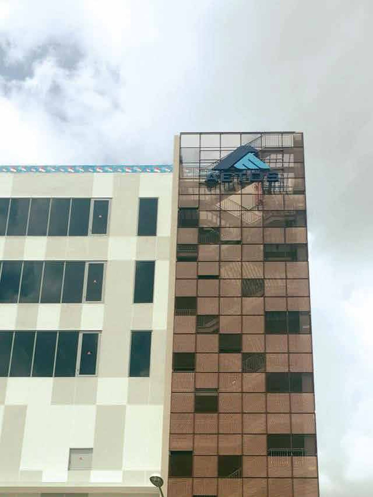 AETOS — tower crown signage