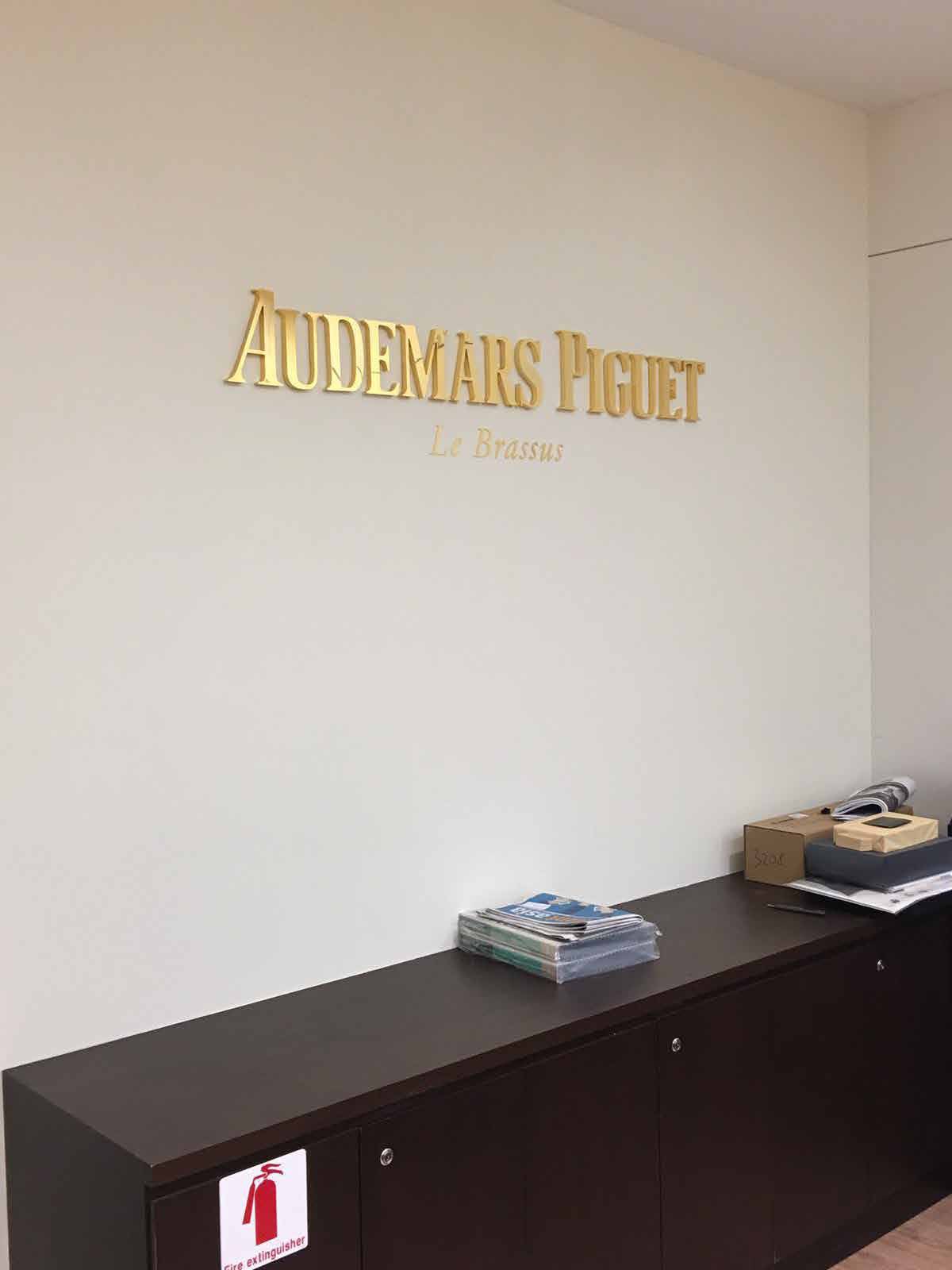 Audemars Piguet — gold-plated dimensional lettering