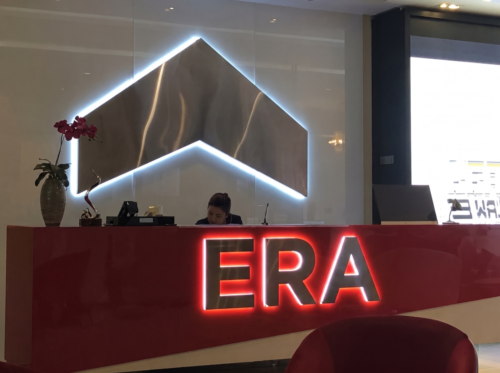 ERA — reception counter · halo-lit