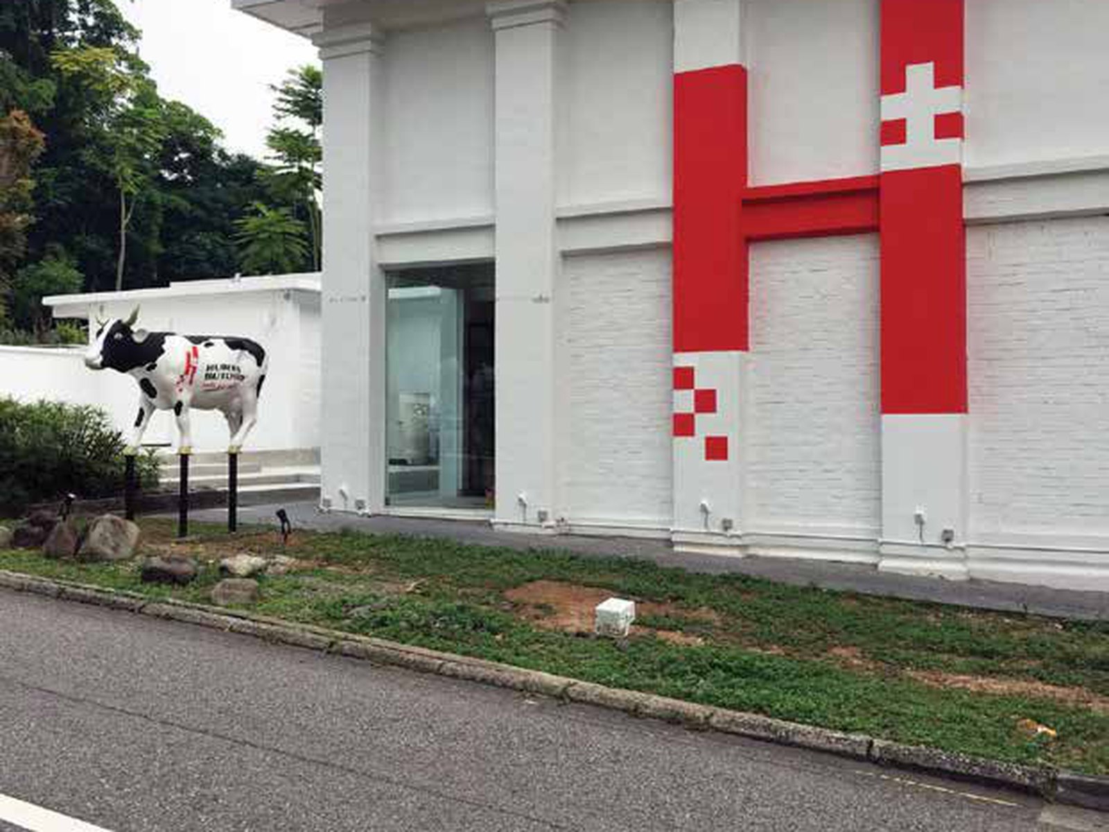 Huber’s Butchery · Dempsey — facade graphics & the cow
