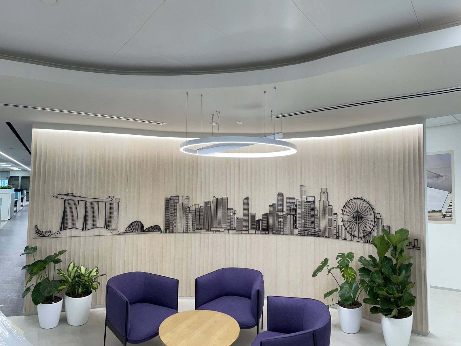 Singapore skyline feature wall — dimensional cut skyline · lounge